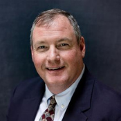 Headshot of Joe Tracy