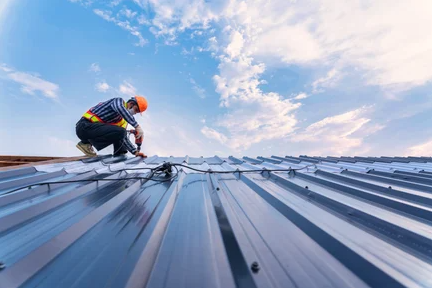 Contractor inspecting a commercial roof
